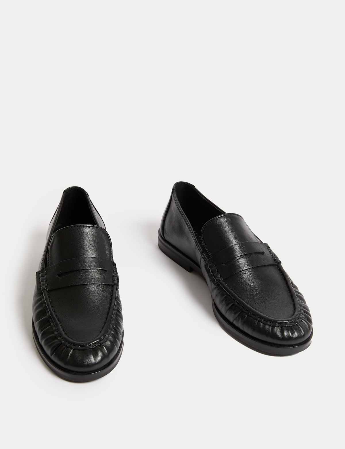 Women's penny loafers in black, pair view | SAVINTARI