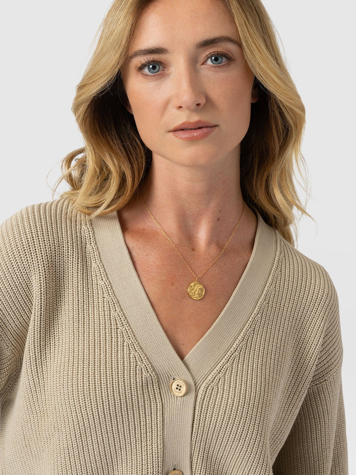 Women beige crop cardigan soft organic cotton knit close-up